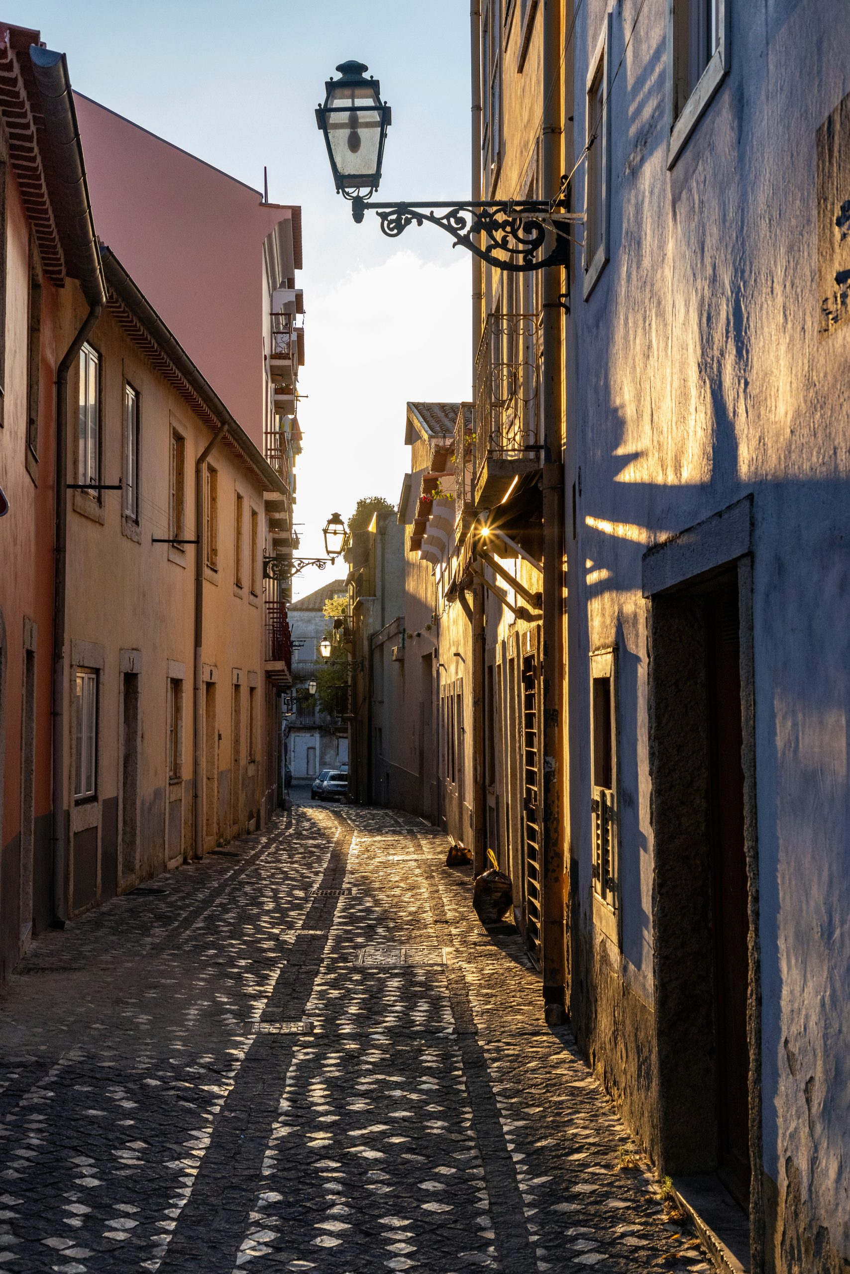 A quiet Lisbon street at sunrise
